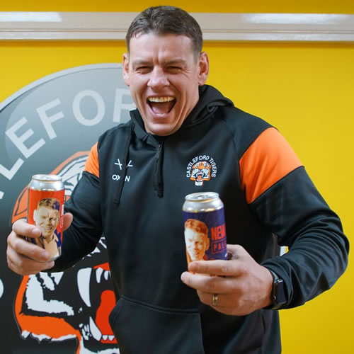 Lee Radford holding Castleford Tigers New era cans of beer